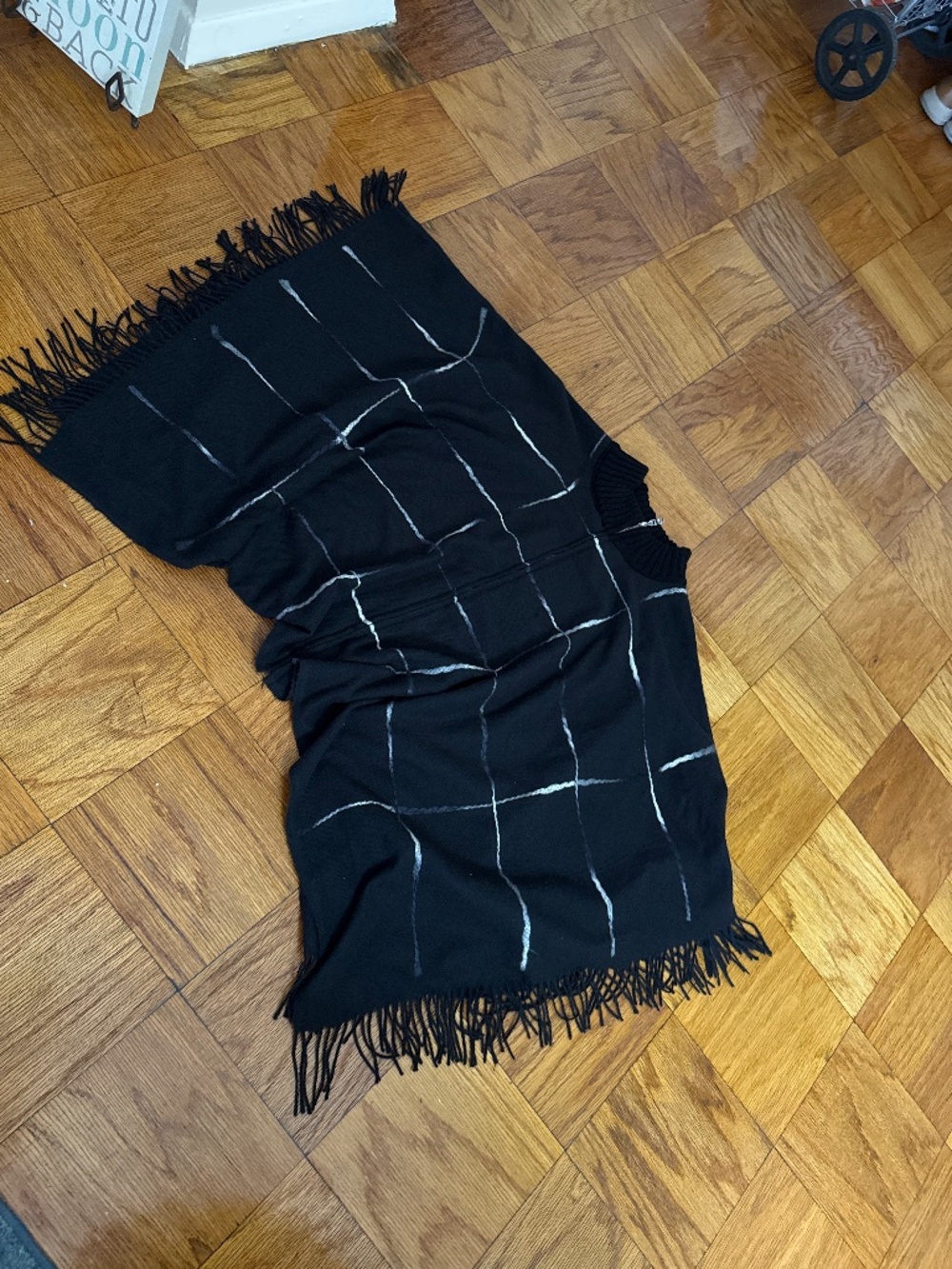 DKNY black/white poncho. Zip front, one size